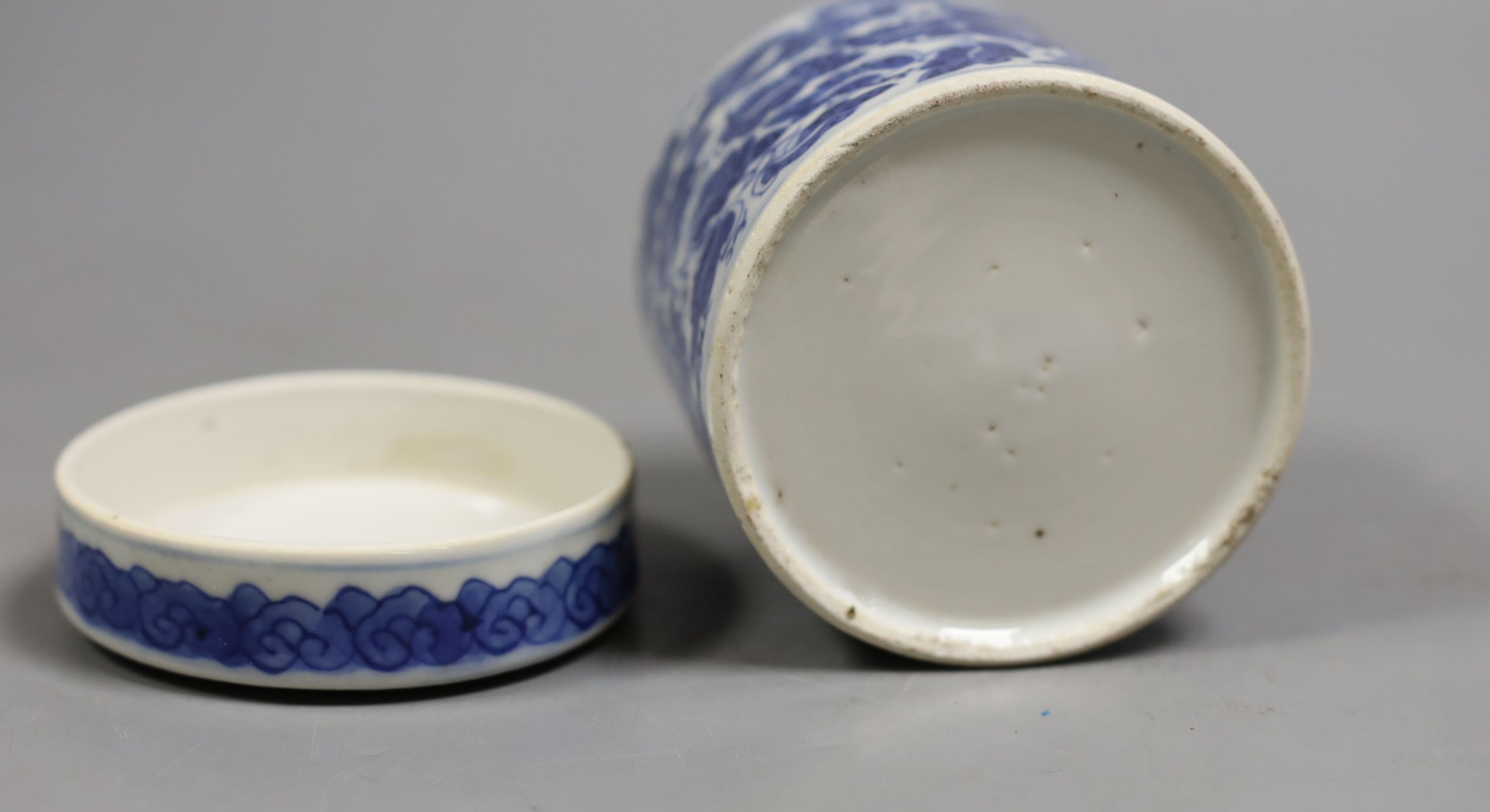 A 19th century Chinese blue and white pot and cover, 9 cms high.